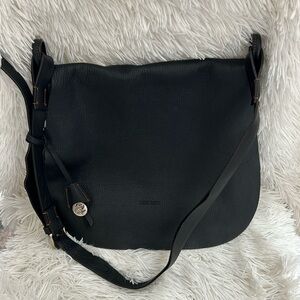 Black leather Dooney & Bourke saddlebag